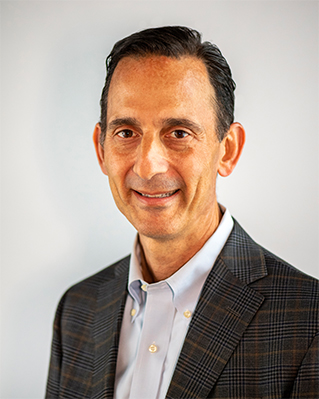 A portrait of Stuart Nachmias.