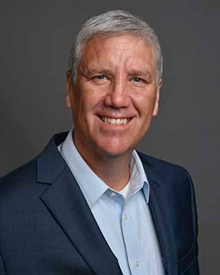 A portrait of Timothy Frost.